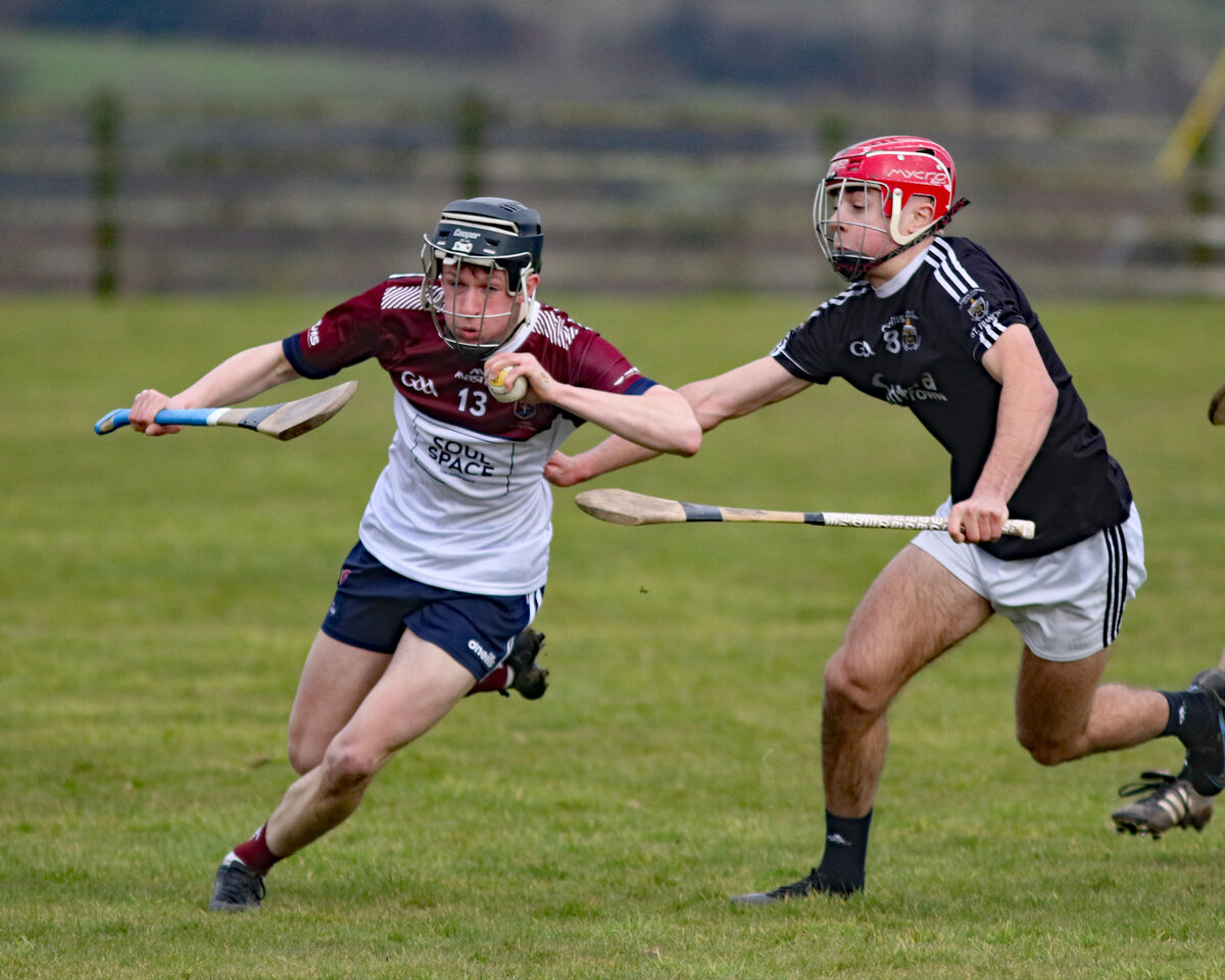 Eanna Ó Lonsiagh, Colaiste Bhaile Chláir, under pressure from William Buckley, Rocco's top-scorer. Picture: Brendan Gleeson