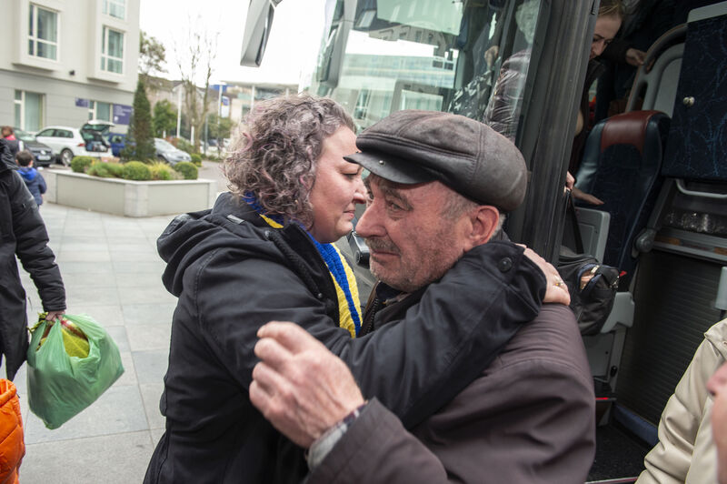 79 year old Adam Petrovsky is greeted by his niece Helena as he arrived at the Kingsley Hotel ,Cork with grandson Hlib, wife Halyna, from Ukraine. Pic Michael Mac Sweeney/Provision