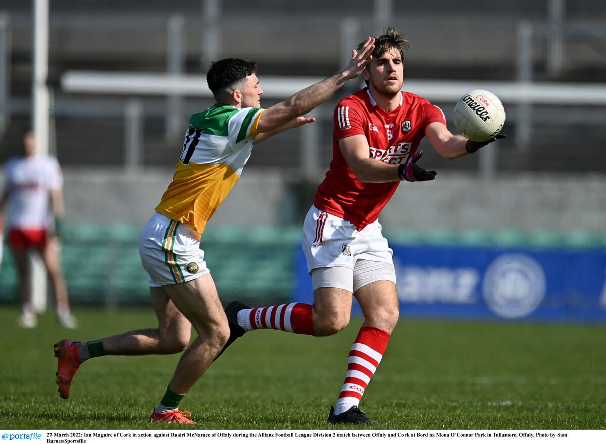 Ian Maguire of Cork in action against Ruairi McNamee of Offaly. Picture: Sam Barnes/Sportsfile