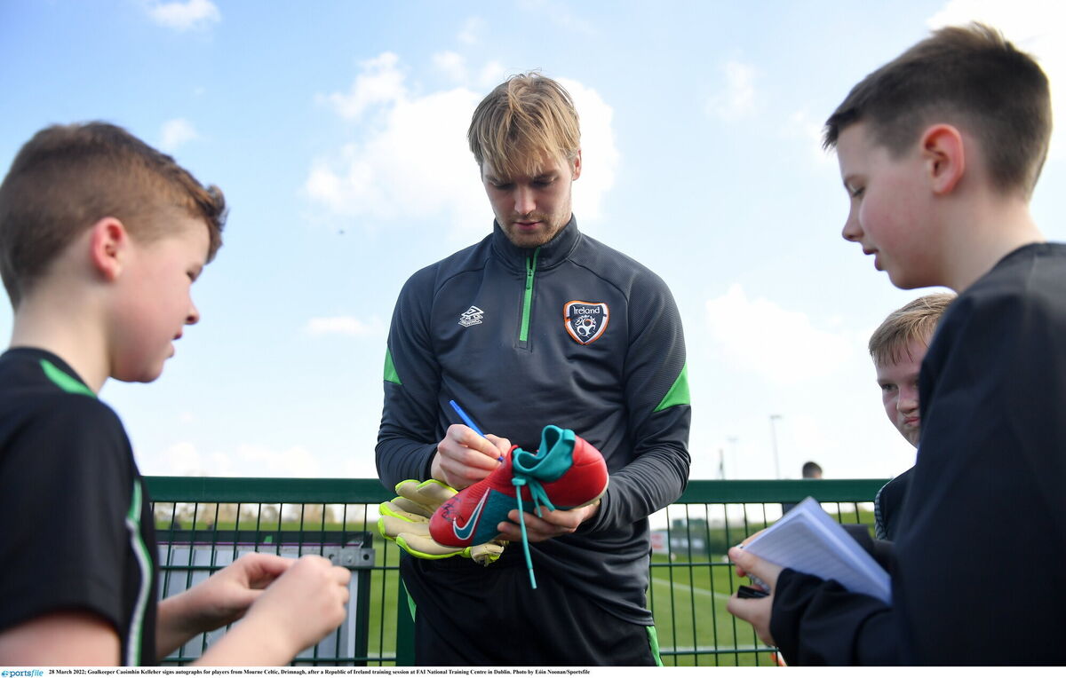 Goalkeeper Caoimhin Kelleher signs autographs for players from Mourne Celtic, Drimnagh, after a Republic of Ireland training session. Picture: Eóin Noonan/Sportsfile