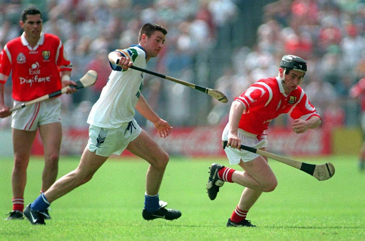 Pat Ryan of Cork in action against Peter Queally of Waterford. Picture: Ray McManus/Sportsfile 