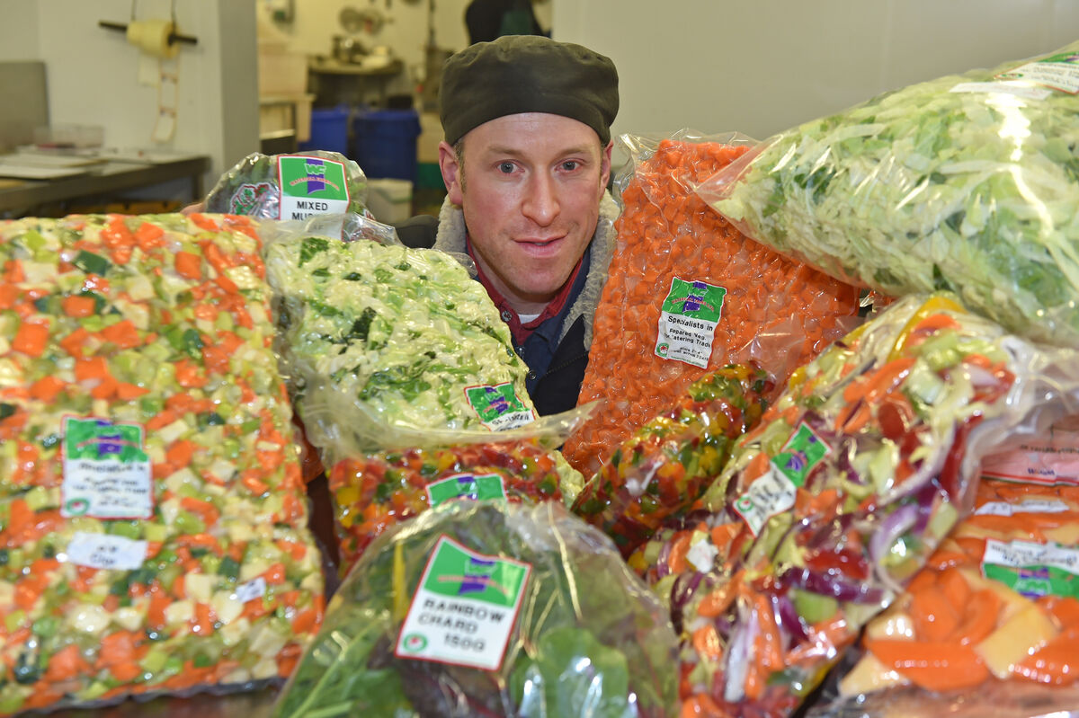 Nigel Martin with a selection of the colourful vegatebles available at Waterfall Farms. Picture; Eddie O'Hare Nigel Martin with a selection of the colourful vegatebles available at Waterfall Farms. Picture; Eddie O'Hare