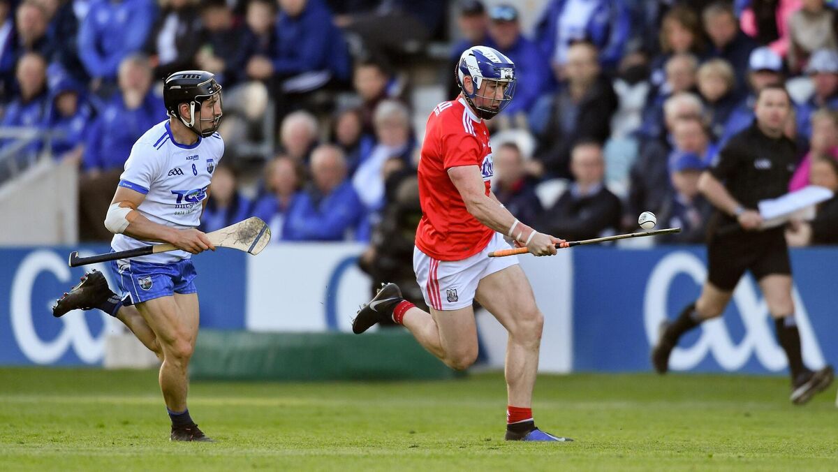 Seán O'Donoghue of Cork gets away from Jamie Barron of Waterford. Picture: Piaras Ó Mídheach/Sportsfile