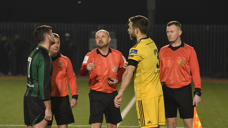 Referee Graham Kelly hangs up his whistle