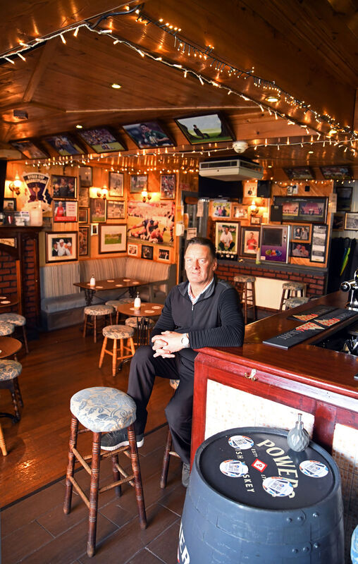 Donncha O'Leary, owner, Jim Cashman's Bar, sitting at the counter.