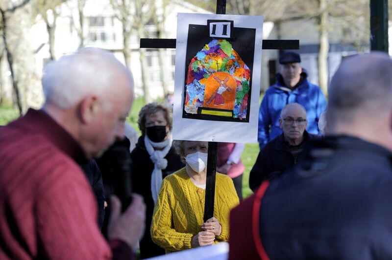 Parishioners follow the Stations of the Cross on Good Friday for the first time in two years at the Lough, Cork City. Picture: Gavin Browne