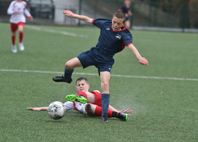 Cork United's Alex Moloney tackles West Cork's Ethan O'Donovan. Picture: Eddie O'Hare