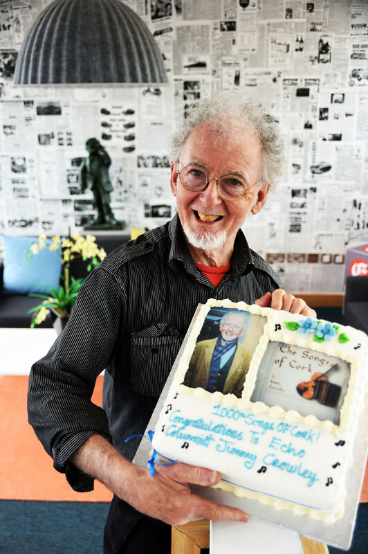  Jimmy Crowley with a special cake baked for him to celebrate his 1000th 'The Songs of Cork' column in The Echo. Picture: Larry Cummins