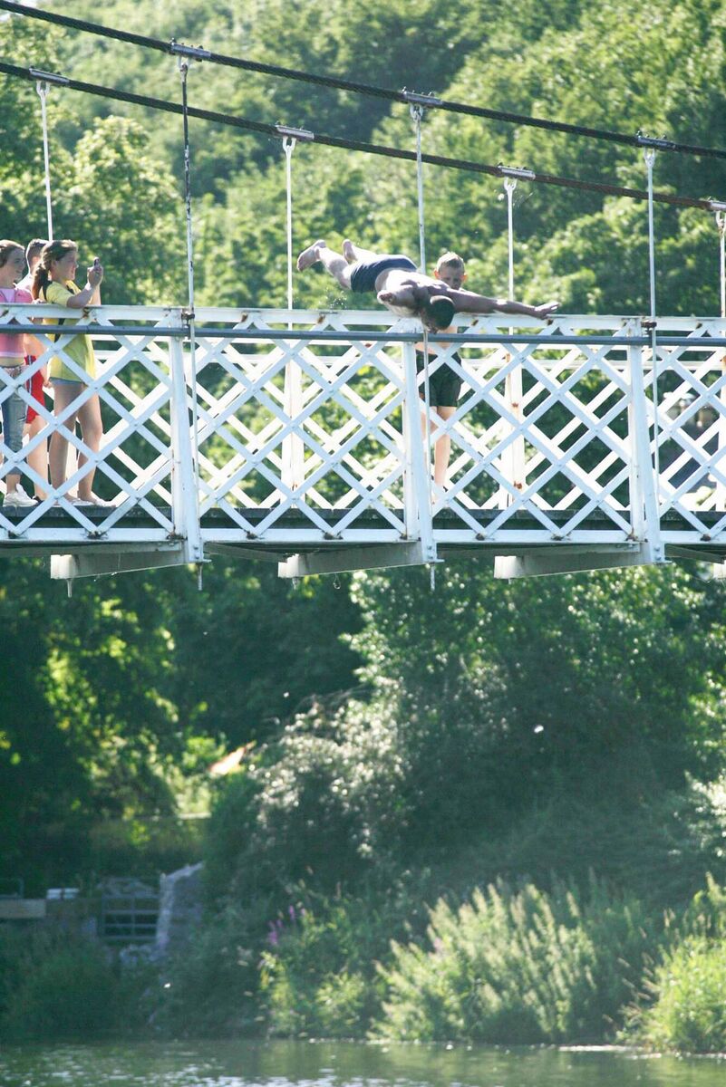 People diving off the Shakey Bridge in 2006. Picture: Cillian Kelly