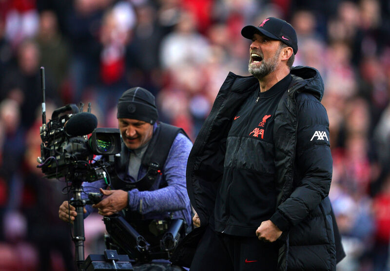 Liverpool manager Jurgen Klopp reacts with the fans on the Kop at Anfield. To the delight of TV stations covering the game. Picture: Peter Byrne/PA Wire