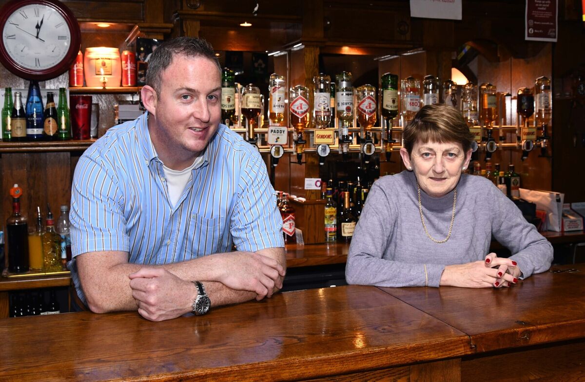 John Stevenson and his mother Joan behind the bar.