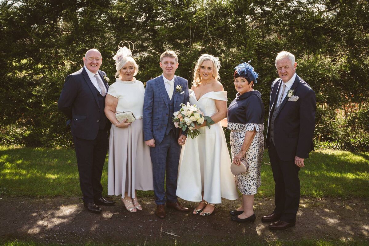 Pictured with their family. Pictured with their family.