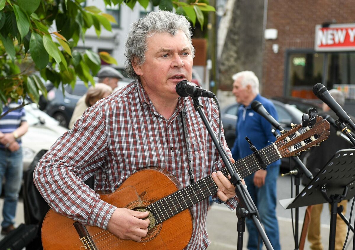  Singer songwriter John Spillane, in fine voice during his performance at the street party in Passage West.
