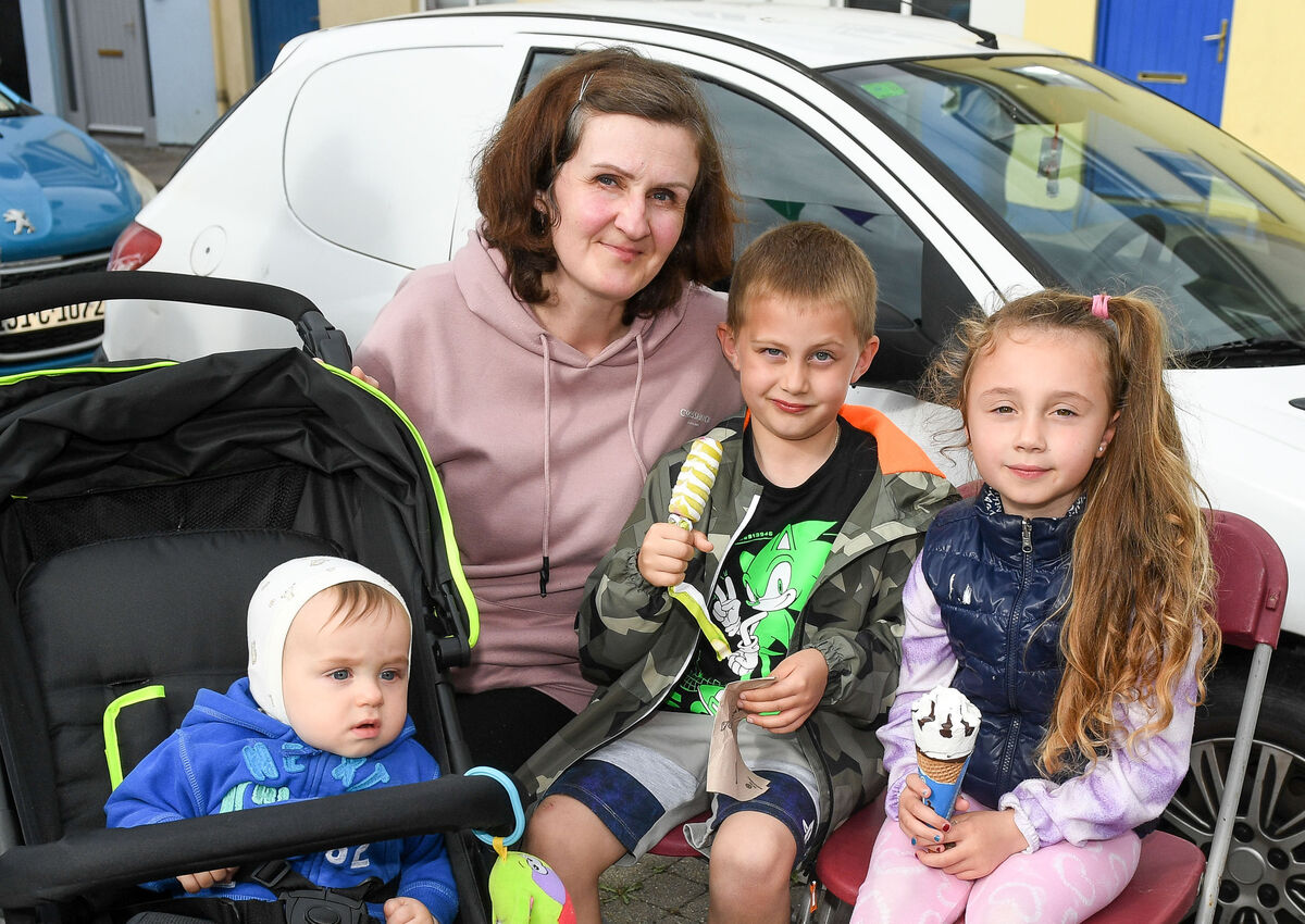 Val Manova along with Ilya and Ivan Manov and Maria Markeviciute, enjoying some ice cream during the street party in Passage West.