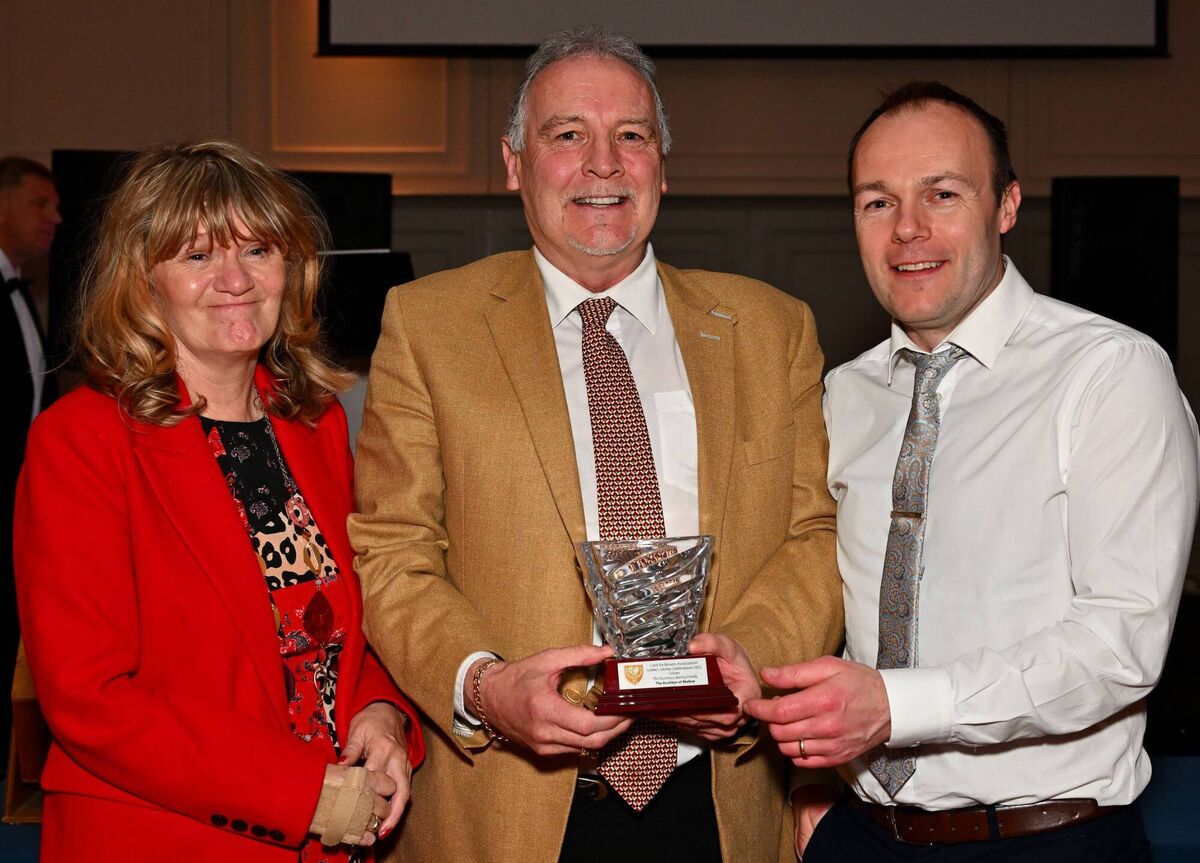 Conal Thomas, on behalf of the Cork Ex-Boxers Association presenting a Distinguished Service Award to Catherine and Patrick Buckley to honour the Mallow familys long association with and support of Cork Boxing at the CEBA Golden Jubilee Dinner in Rochestown Park Hotel. Picture: Doug Minihane Conal Thomas, on behalf of the Cork Ex-Boxers Association presenting a Distinguished Service Award to Catherine and Patrick Buckley to honour the Mallow familys long association with and support of Cork Boxing at the CEBA Golden Jubilee Dinner in Rochestown Park Hotel. Picture: Doug Minihane