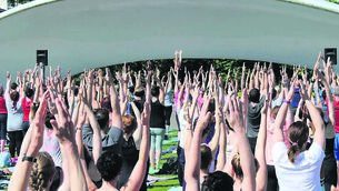 <p class="contextmenu internal_Caption">ENJOYING THE LONG STRETCH IN THE EVENINGS: Yoga In The Park is always a big summer hit in Fitzgerald’s Park, Cork city</p>