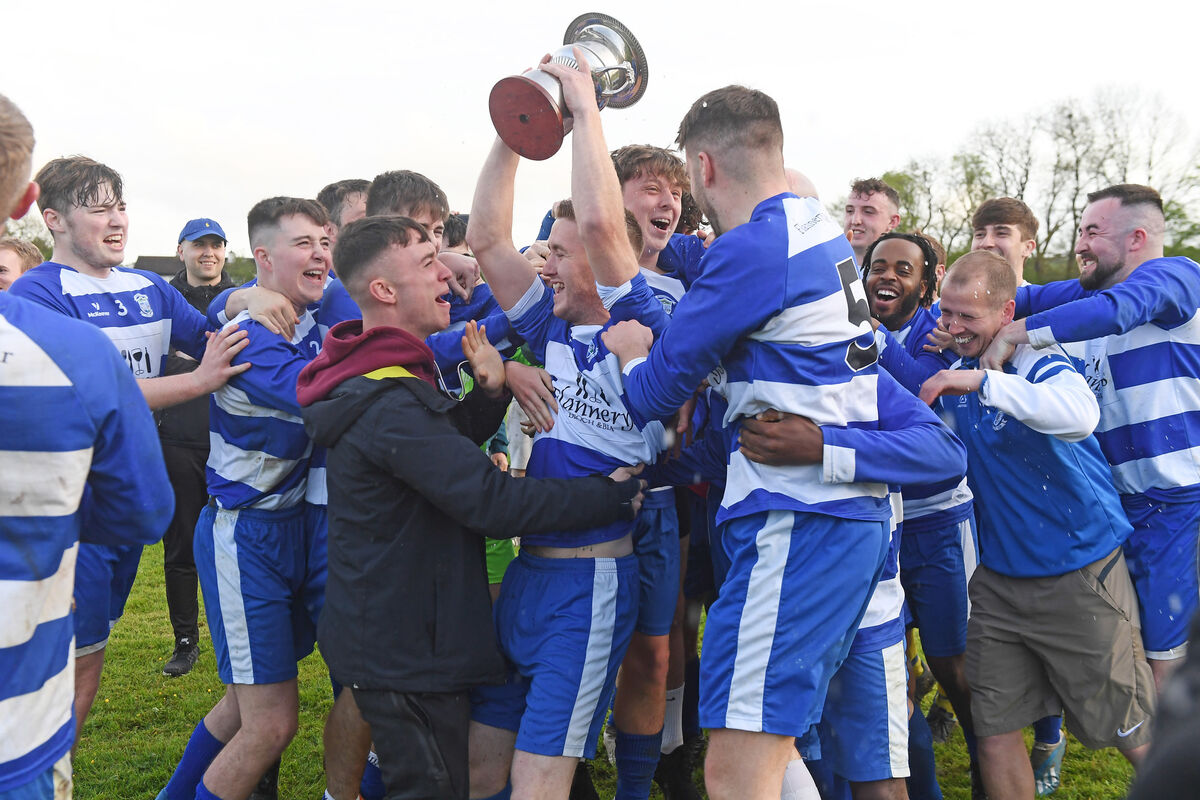Glasheen captain Declan O'Flaherty, players and management celebrate after winning the Beamish Stout Junior Second Division at Murphy's Farm. Picture; Eddie O'Hare