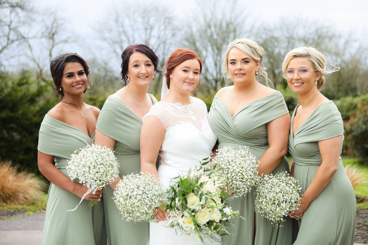 Sarah King with her bridesmaids. The bride’s dress was bought by her mother before she passed away, in Cinderella’s Closet. Sarah King with her bridesmaids. The bride’s dress was bought by her mother before she passed away, in Cinderella’s Closet.