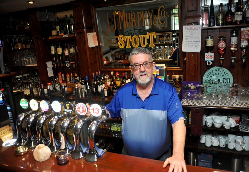  Michael Sheahan behind the counter at The Killumney Inn, which has been in his family for 40 years. Picture: Larry Cummins