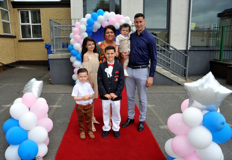  Dylan Byrne with parents Laura Ann and Anthony (snr) with siblings Anthony (jnr) Taylor and Darragh back at the school after the communion ceremony Pic: Larry Cummins. 