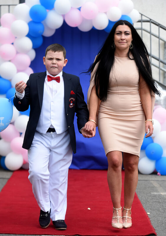  Lewis Coveney and Melissa O'Donoghue, SNA at the school after the communion ceremony. Pic: Larry Cummins. 