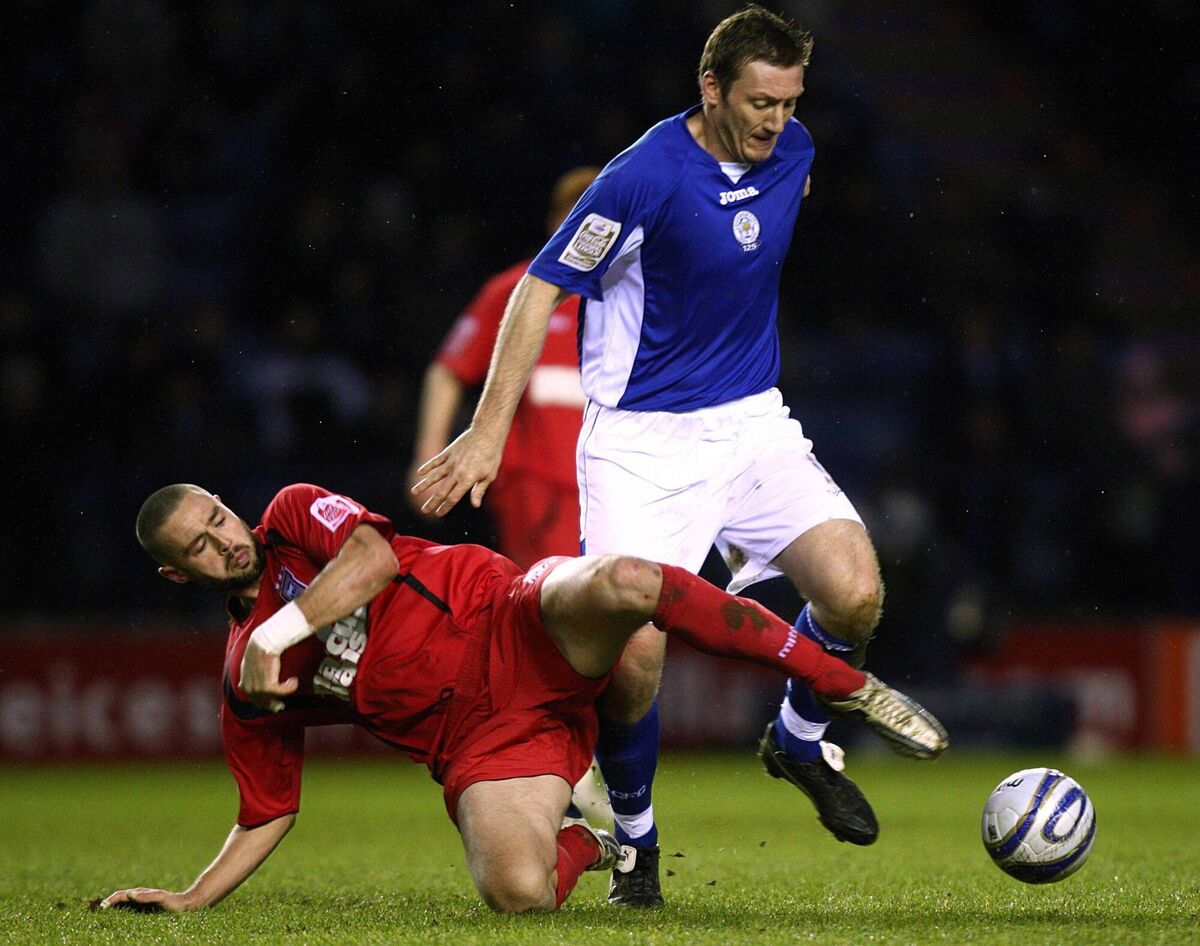 Leicester City's Steve Howard (right) and Ipswich Town's Damien Delaney Leicester City's Steve Howard (right) and Ipswich Town's Damien Delaney