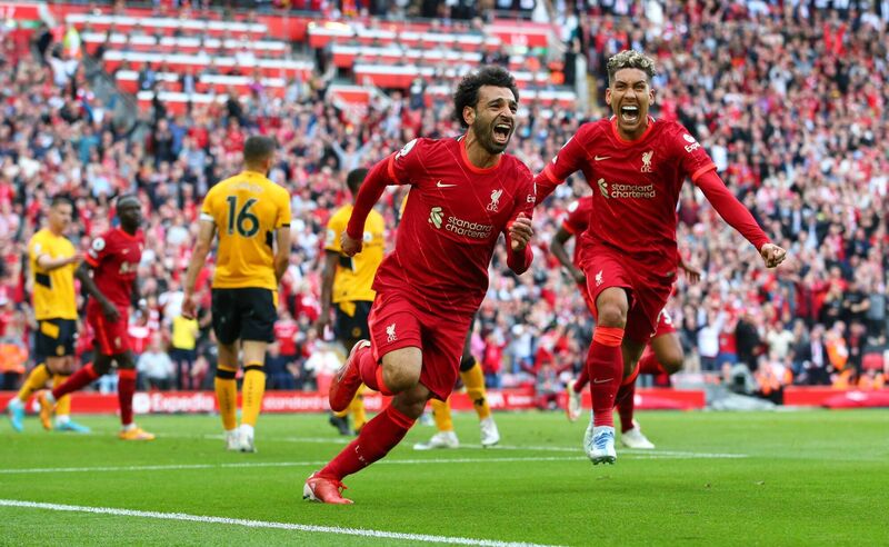 Mohamed Salah of Liverpool celebrates after scoring the side's second goal during the Premier League match against Wolverhampton Wanderers at Anfield. Picture:  Alex Livesey/Getty Images