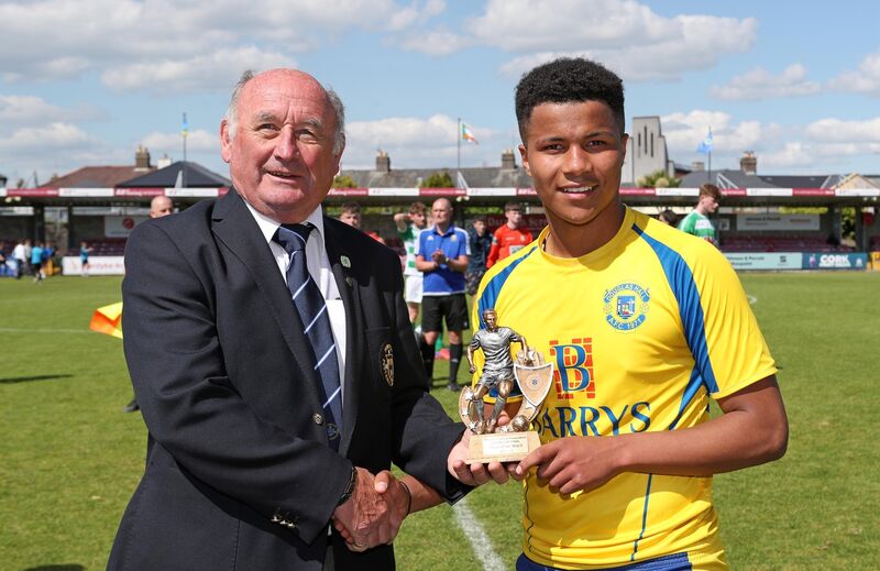  Richare Browne, Munster Football Association, presents the Player of the Match Trophy to Adrien Thibaut, Douglas Hall.