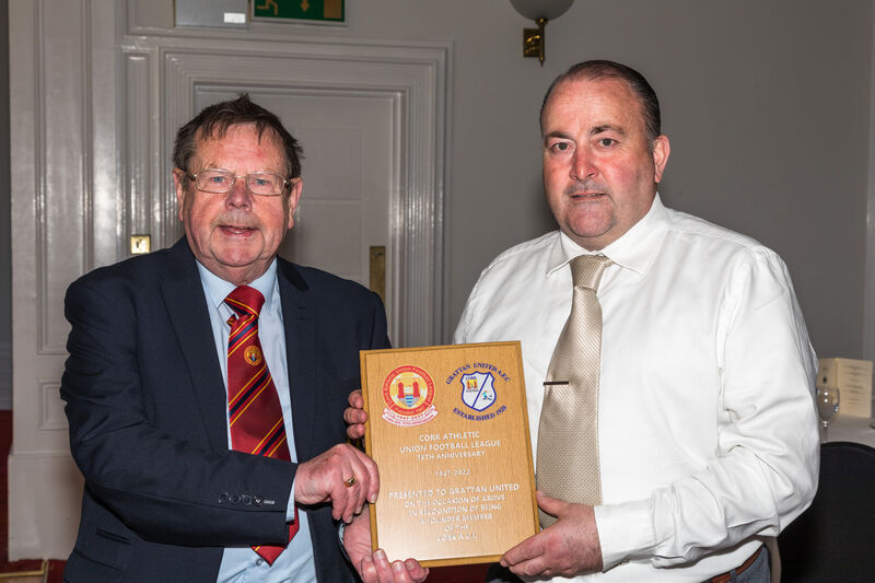 Tom Fitzgerald making a presentation to Gavin O'Mahony, Grattan United. Picture: David Creedon