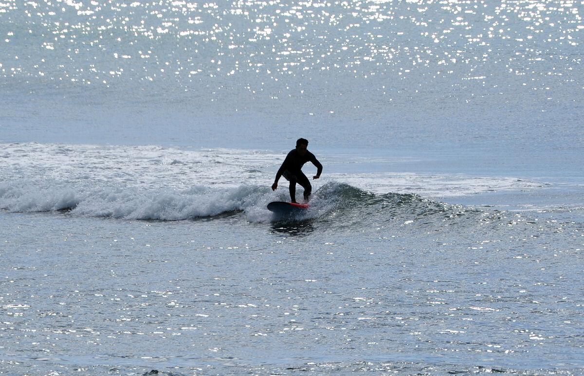 Enjoying the surfing at Garrettstown, Co. Cork. Picture Denis Minihane. Enjoying the surfing at Garrettstown, Co. Cork. Picture Denis Minihane.