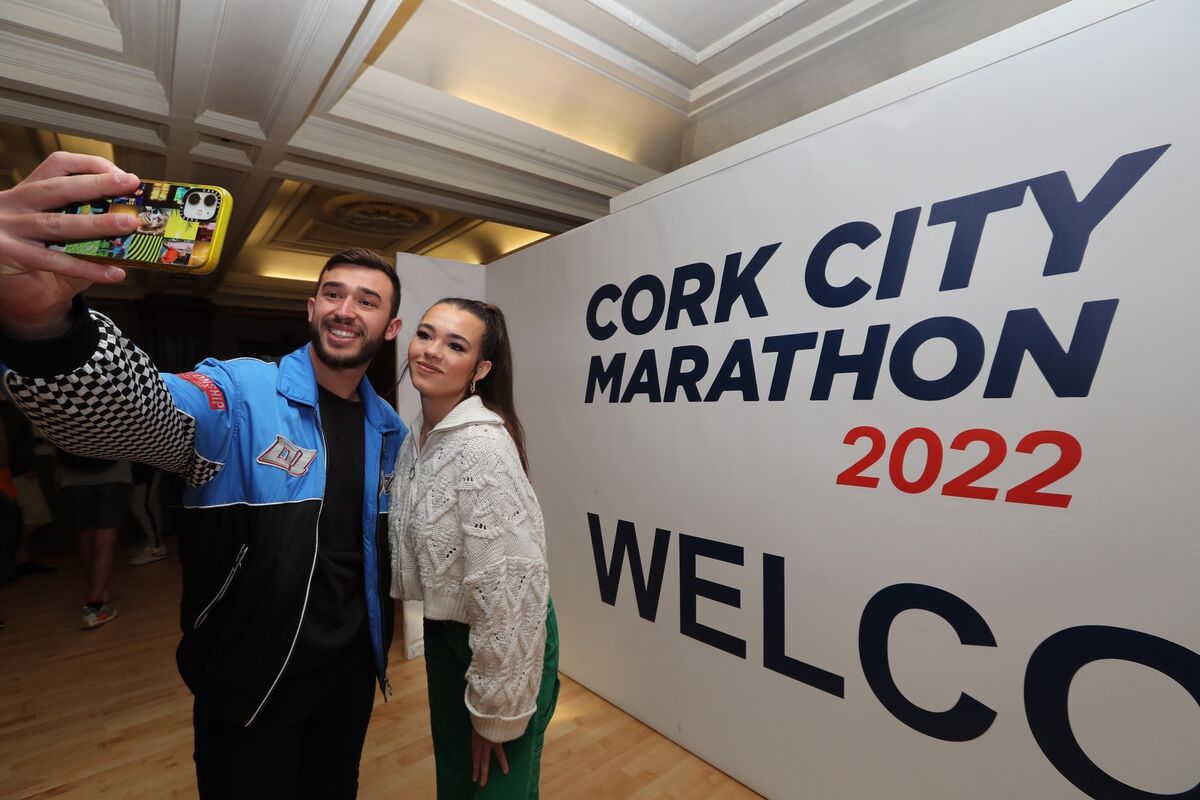 Pictured are Tiaan Heyns and Miriam Mullins, Tiktok stars, at the 2022 Cork City Marathon Registration and Expo, at the Concert Hall, City Hall, Cork. Picture: Jim Coughlan.