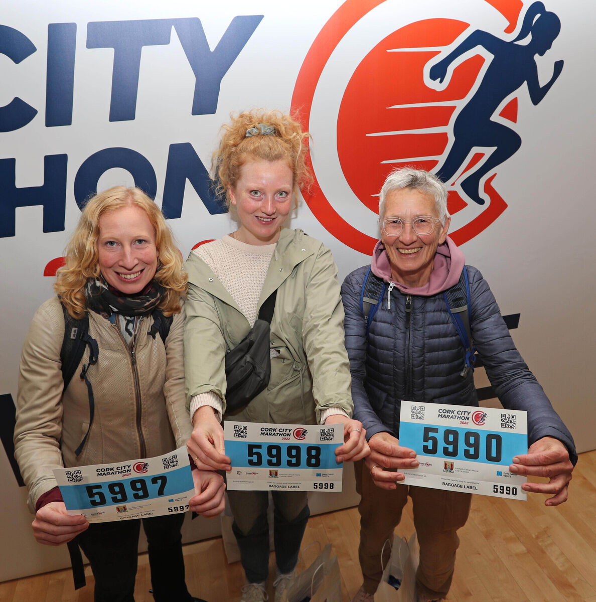Pictured is Charlotte Waltz (centre), originally form the Neterlands now living in Cork City Centre with Simone and Elizabeth Waltz, both Netherlands, running ion the half marathon, at the 2022 Cork City Marathon Registration and Expo, at the Concert Hall, City Hall, Cork. Picture: Jim Coughlan.