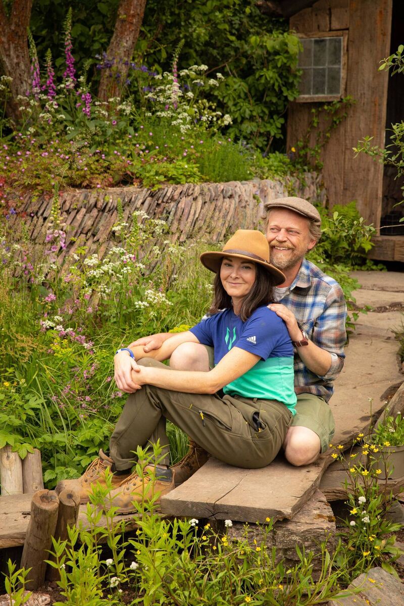 Valerie Keating Bond, from Cork, with landscape designers Adam Hunt and Lulu Urquhart, in their Rewilding Britain garden which won the top award at the Chelsea Flower Show. (Picture: Tammy Marlar) 