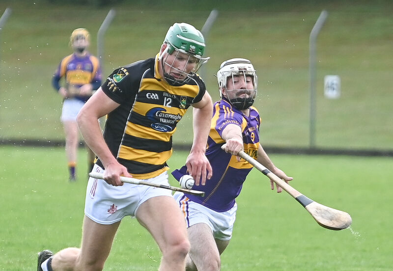Avondhu's Colin O'Brien tries to get away from Carbery's Jeremy Ryan, during their Cork Premier SHC clash at Coachford. Avondhu's Colin O'Brien tries to get away from Carbery's Jeremy Ryan, during their Cork Premier SHC clash at Coachford.