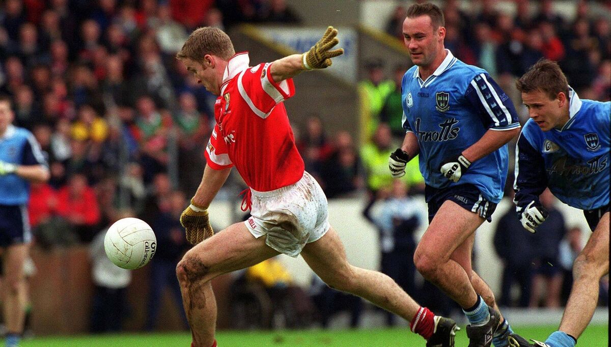 Cork's Podsie O'Mahony in action against Paul Curran and Keith Galvin, Dublin, in the 1999 league final at Páirc Uí Chaoimh. Picture: Aoife Rice/SPORTSFILE