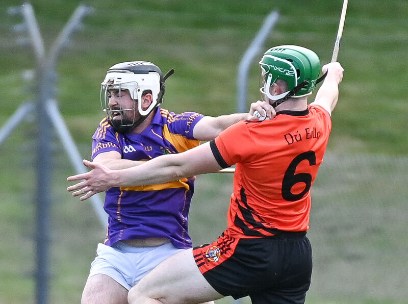 Carbery's Jeremy Ryan keeps possession under pressure from Duhallow's Jack Murphy, during their Divisions/Colleges Cork Premier SHC clash at Coachford.