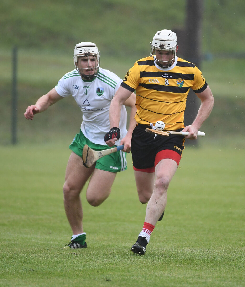 Carrigdhoun's Michael O'Sullivan breaks from Muskerry's Brian Keating. Picture: Eddie O'Hare Carrigdhoun's Michael O'Sullivan breaks from Muskerry's Brian Keating. Picture: Eddie O'Hare
