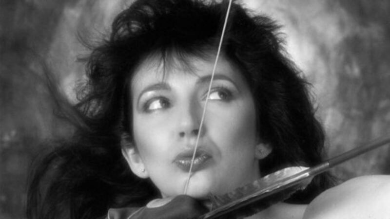 Kate Bush breaks trio of chart records as Running Up That Hill claims top spot