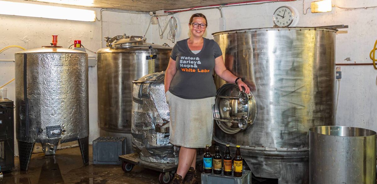 Terra filling the ingredients into the vats Picture: Anne Marie Cronin Photography