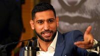 Three men charged after boxer Amir Khan ‘robbed at gunpoint’