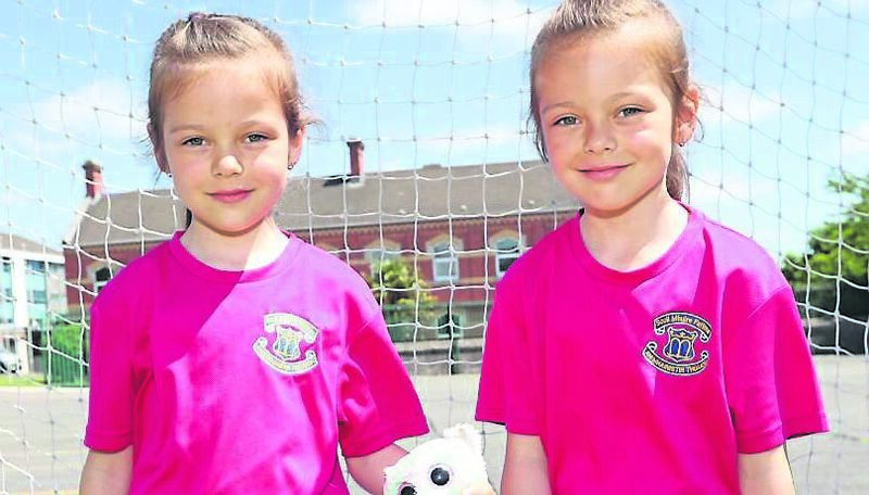  Twins, Kira and Erika Yananetska, new to Junior Infants from the Ukraine. Picture: Jim Coughlan.