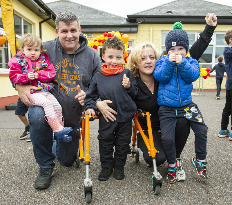 Hannah, Dad Fergal, Adam, Mum Therese and Ned Clarke , Five year old Adam Clarke completes final leg of mini-marathon in the company of friends and family and raises funds for Enable Ireland.