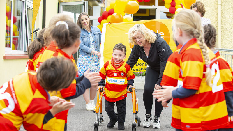 Five-year-old Adam crosses finish line to raise money for 'life-changing' charity 
