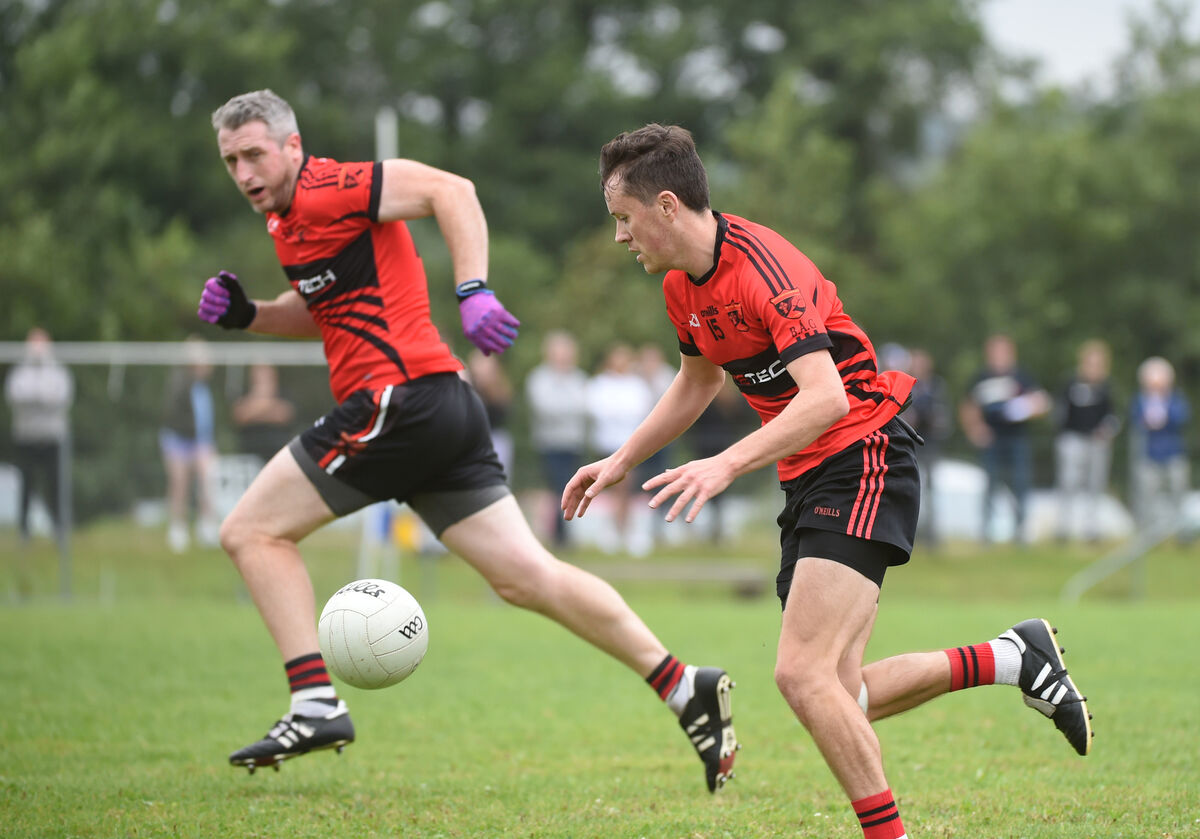 Ben Shorten, Ballingeary with support from Leonard O'Conchuir in attack. Ben Shorten, Ballingeary with support from Leonard O'Conchuir in attack.