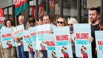 Community workers strike over pay outside Social Protection offices