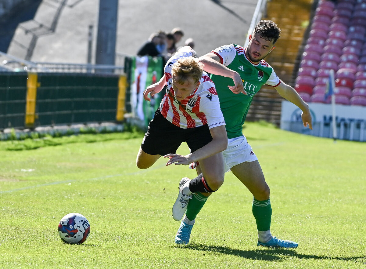  Stoke City's Connor Taylor is sent flying by Cork City's Matt Srbely, during their friendly match at Turner's Cross.