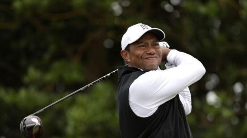 Tiger Woods struggles to make headway in unlikely bid to make Open cut