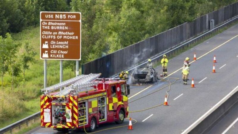 Passengers get lucky escape after car burst into flames on Clare motorway Passengers get lucky escape after car burst into flames on Clare motorway