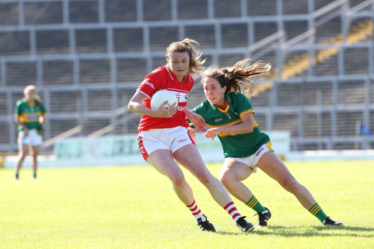 Annie Walsh in action against Denise Hallissey of Kerry during her playing days with Cork.