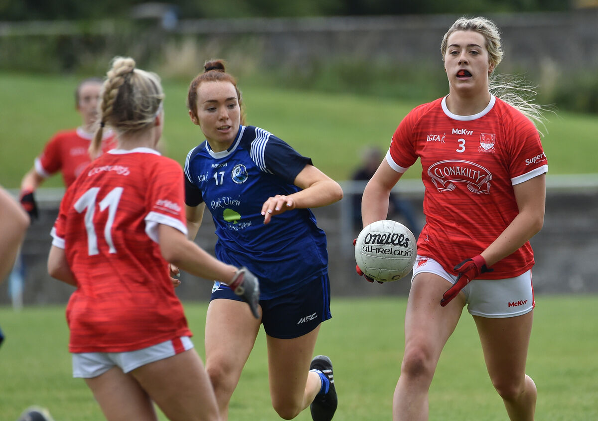 Lia Heffernan looking to pass to Abigail Ring watched by Áine Smith of Cavan. Picture: Dan Linehan Lia Heffernan looking to pass to Abigail Ring watched by Áine Smith of Cavan. Picture: Dan Linehan
